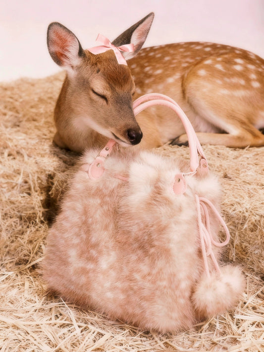 Rose Island is close to Xiaolu. Toca premium eco-friendly fur tote bag with drawstring, adjustable for a winter vibe.